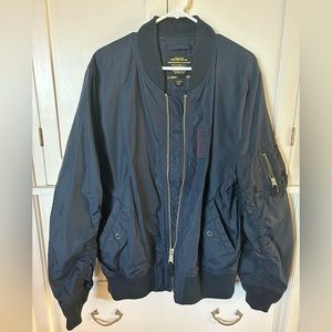 Great condition Alpha Industries men’s bomber jacket in Navy Blue.